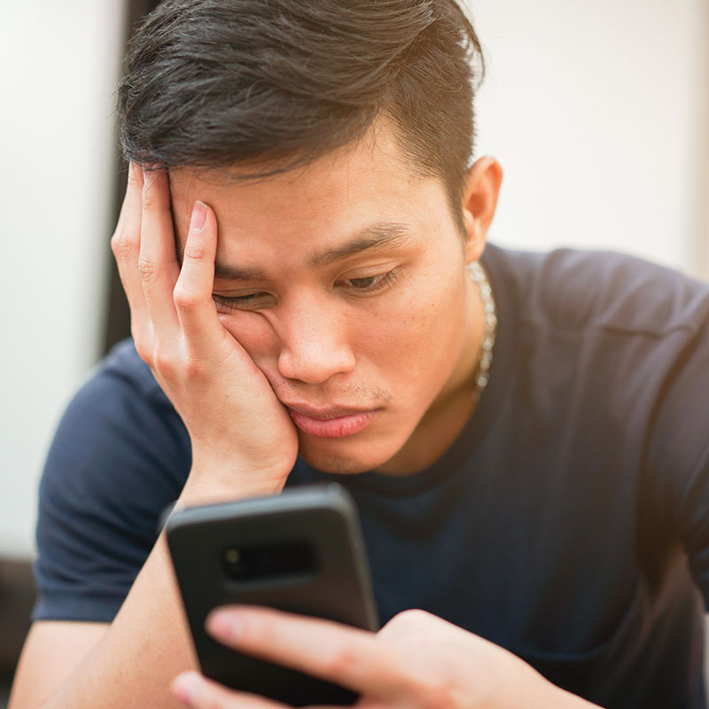 Sad man on hold