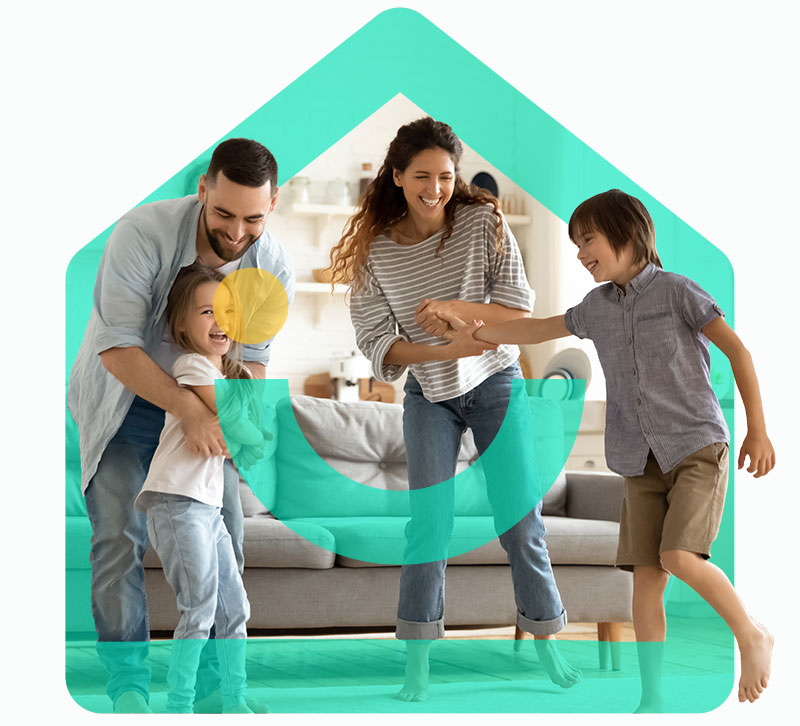 Family dancing in new home